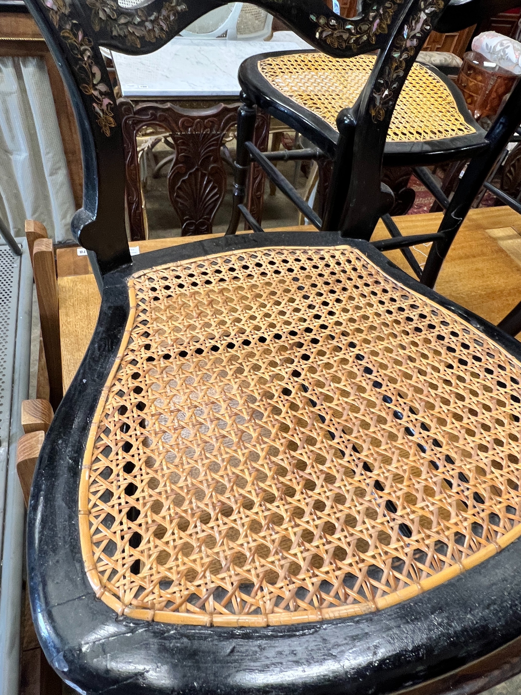 Five Victorian mother of pearl inlaid papier mache cane seat chairs